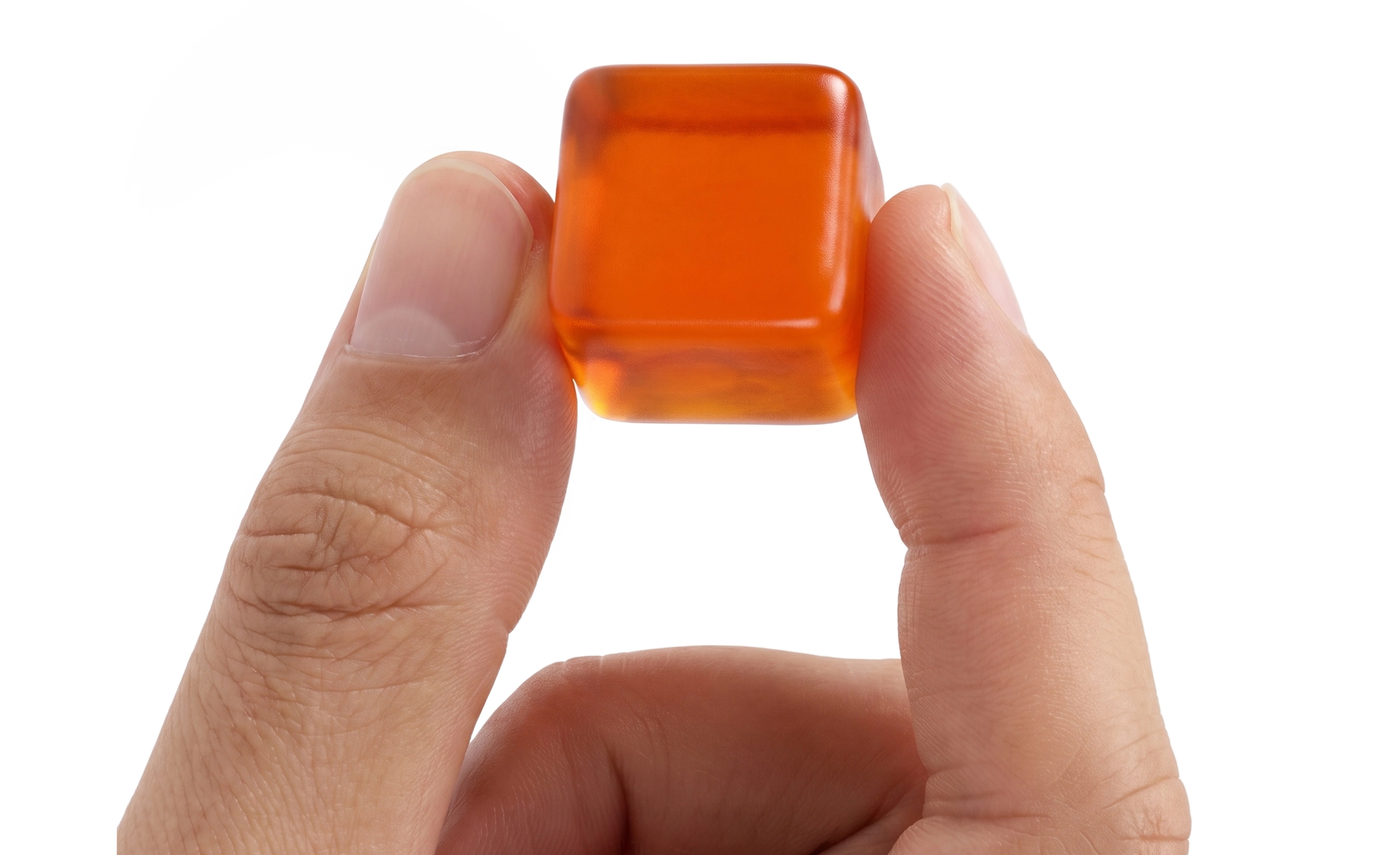 Hand holding VAST gummies